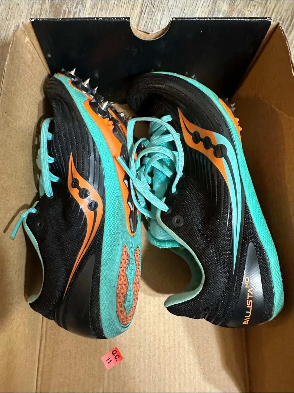 Saucony Women’s Black and Teal Lace-Up Running Spikes size 5.5 with original box